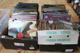 Three boxes of LP and 45rpm records.