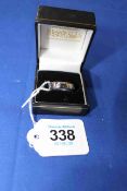 Palladium band ring set with single small diamond, size V.