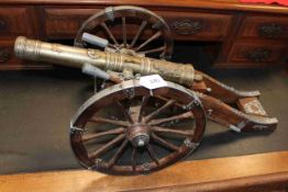 Metal and wood ornamental cannon, 70cm length.