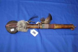 America native club with beads and feathers, 43cm length.