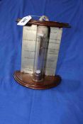 Mahogany barometer.