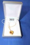 9 carat gold heart shaped pendant necklace with citrine and seed pearls.