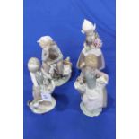 Collection of four Lladro girl figures.