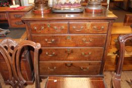 Georgian oak chest of two short above three long graduated drawers on shaped bracket feet,