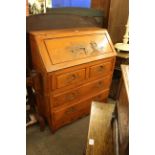 Carved Oriental hardwood four drawer bureau.