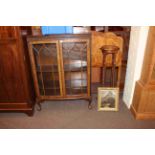 Early 20th Century mahogany two door china cabinet, walnut bed head, twist column plant stand,