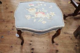 Cabriole leg stool of serpentine form with floral needlework seat, 43cm by 51cm.