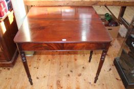 Victorian mahogany fold top tea table on ring turned legs, 73cm by 91cm (closed).