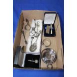 Box with mostly silver items including bookmark, wine taster, sugar nips, etc.