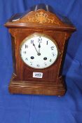 Edwardian inlaid mahogany striking mantel clock.