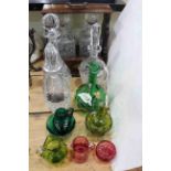Victorian ruby and green glass crystal decanters with labels and two bottle tantalus.