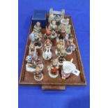 Collection of thirteen Hummel figures, Lilliput Lane Tower Bridge, Windsor Castle and Penrith Clock,