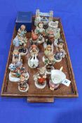 Collection of thirteen Hummel figures, Lilliput Lane Tower Bridge, Windsor Castle and Penrith Clock,