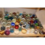 Collection of detailed patterned, patterned, coloured, cut glass paperweights including cup cakes,