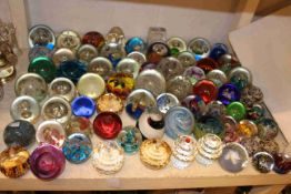 Collection of detailed patterned, patterned, coloured, cut glass paperweights including cup cakes,