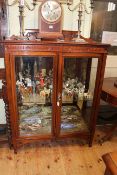 Late 19th/early 20th Century carved mahogany two door vitrine, 141cm by 102cm.