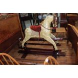 Lawsons Toys, Penshaw, rocking horse on safety stand, 127cm by 170cm.