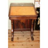 Victorian rosewood Davenport having panelled side door enclosing four drawers, 82.5cm by 59cm.