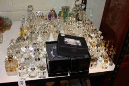 Collection of cut crystal scent and perfume bottles.