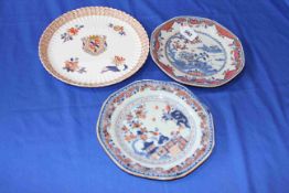 Two Chinese export plates and an armorial dish (3).