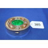 Continental silver and enamel oval box, with ornate lid, unmarked, 7cm across.