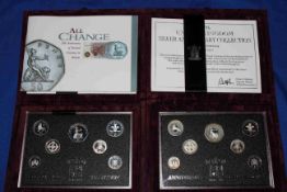 Two Royal Mint 1996 UK Silver Anniversary collection and a 2008 UK Royal Shield of Arms silver