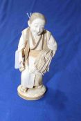 Good Japanese ivory Okimono of harvester with sheaf and cricket, signed 15cm.