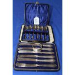 Cased set of six silver teaspoons, silver handled tea knives and napkin ring.