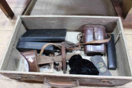 Vintage suitcase with stereoviewer and cards, binoculars, instruments, etc.