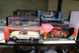 Ten boxed Diecast model vehicles, toys include Arlen Ness motorcycles, Kurtis Kraft Roadster,