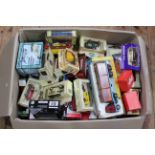 Box of die-cast model vehicles.