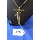 Gold 'Jesus on the Cross' pendant with 9 carat gold necklace.