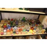 Large collection of coloured and domed paperweights.