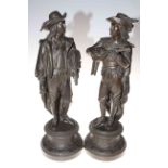 Pair spelter figures depicting men playing musical instruments, 53cm in height.