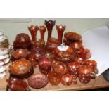 Large collection of orange Carnival glass including vases, bowls, jugs, cups, etc.