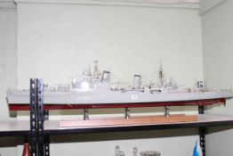 Large model of Naval battleship on stand, 140cm long.