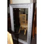 Silvered framed rectangular bevelled wall mirror, 146.5cm by 85.5cm overall.