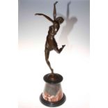 Large bronze model of a dancing girl on marble plinth.
