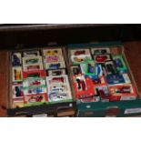 Two boxes of model vehicles.