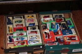 Two boxes of model vehicles.