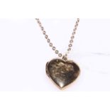 Heart shape locket on 9 carat gold chain necklace.