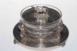 Late Victorian silver plated butter dish, the frame with cherub masks and cover with cow finial.