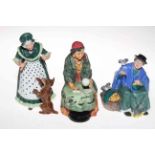 Three Royal Doulton figures 'Old Mother Hubbard', 'Tuppence a Bag' and 'Fortune Teller'.