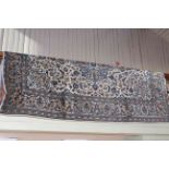 Persian wool (Iranian) carpet with classic floral medallion design on cream ground, 2.90 by 2.00.