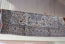 Persian wool (Iranian) carpet with classic floral medallion design on cream ground, 2.90 by 2.00.