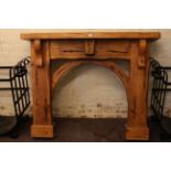 Rustic pine fire surround.