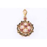 Ruby and seed pearl set 18 carat gold pendant.