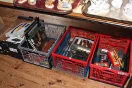 Four boxes with model railway, books, etc.