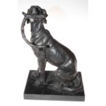 Bronze sculpture of working dog with stick on marble plinth.