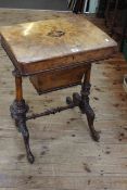 Victorian inlaid walnut sewing table raised on turned supports, 69cm by 53.5cm.